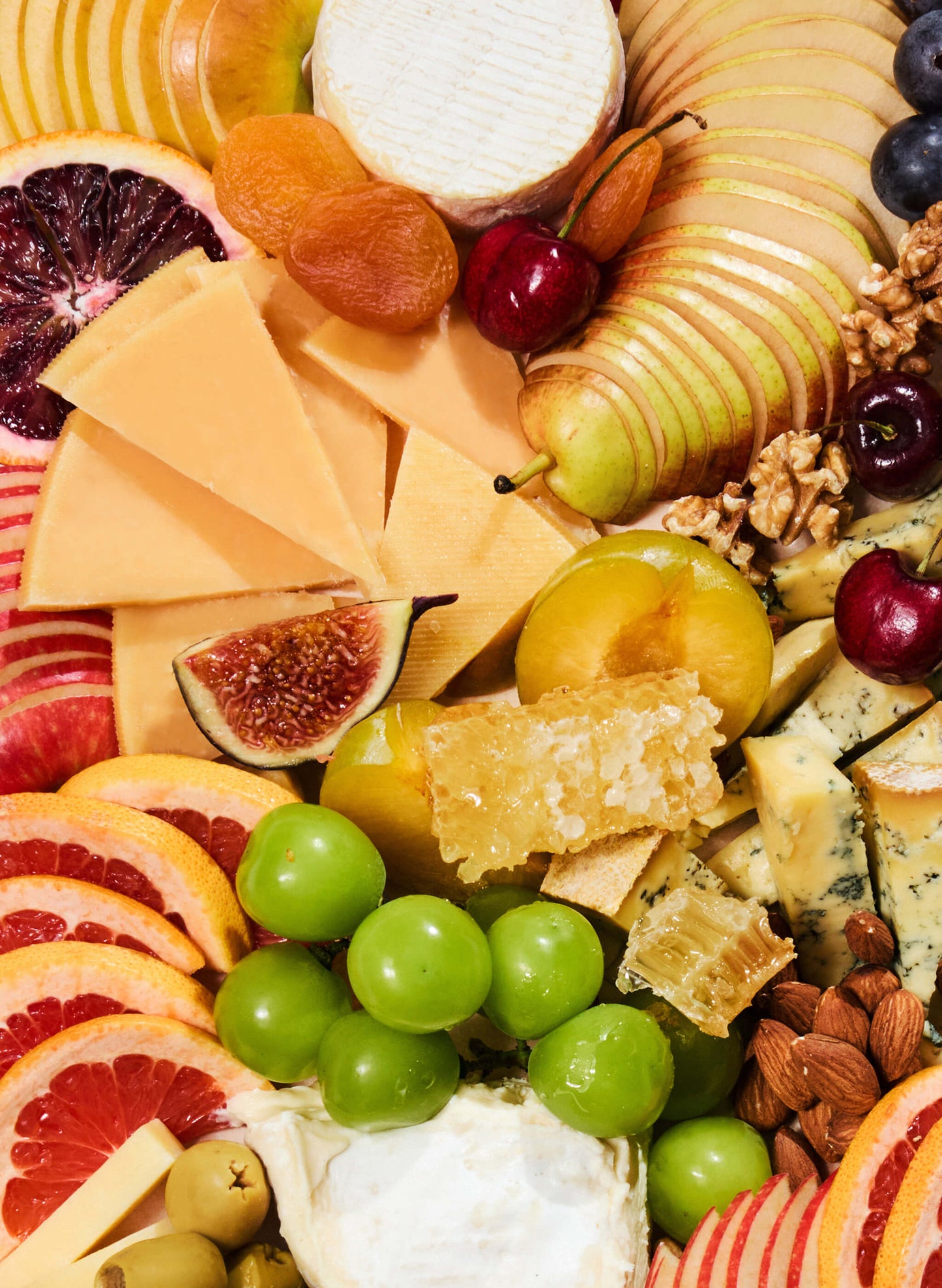 A cheese platter of our selection of nicely cut finest cheese and cold cuts with antipasti, nuts, fresh & dried fruits, vegetables, mini honey & chutney pots, topped with seasonal garnishes. Comes ready to eat. The perfect pick for home parties, corporate event or as a gift. Free delivery Hong Kong.