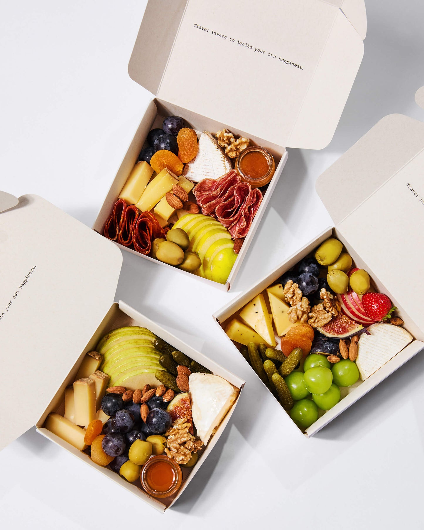A cheese box of our selection of nicely cut finest cheese and cold cuts with antipasti, nuts, fresh & dried fruits, vegetables, mini honey pots, topped with seasonal garnishes. Comes ready to eat. The perfect pick for home parties, corporate event or as a gift.