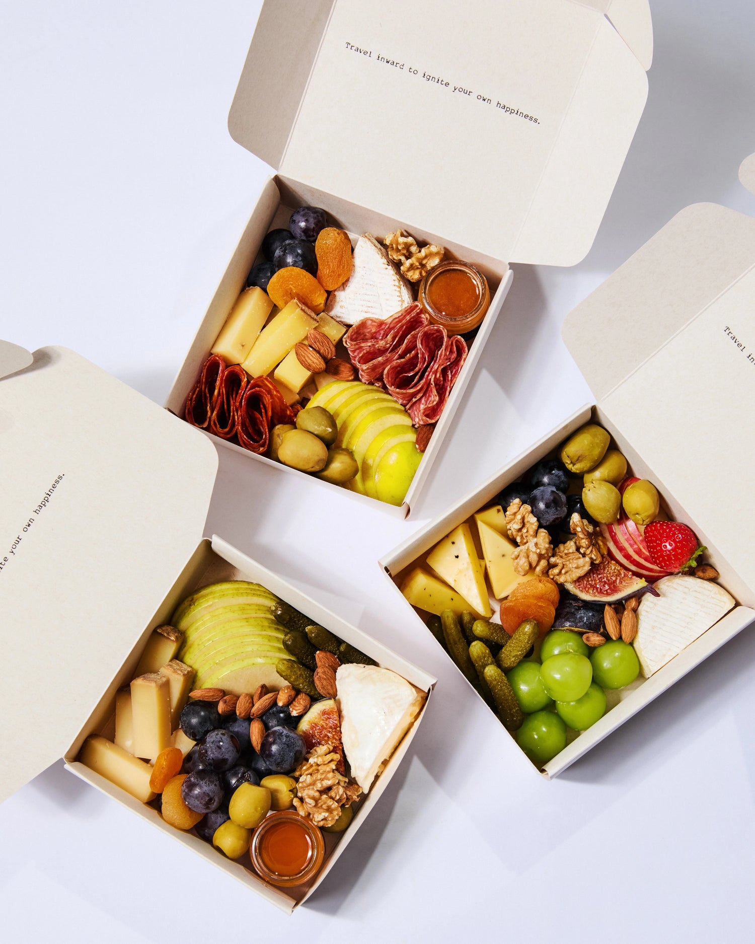 Cheese box of nicely cut finest cheese and cold cuts with antipasti, nuts, fresh & dried fruits, vegetables, mini honey & chutney pots, topped with seasonal garnishes. Comes ready to eat.