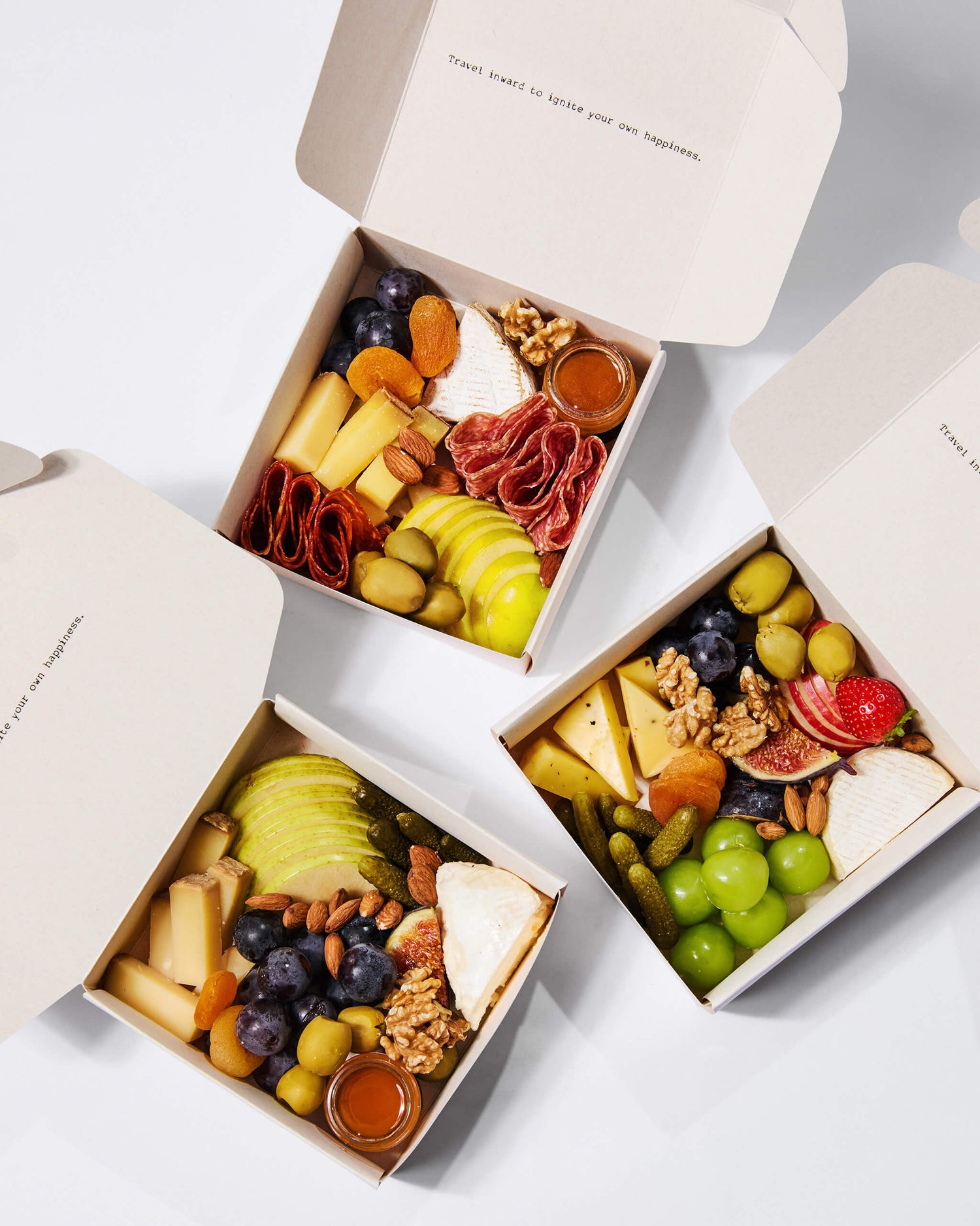 A cheese box of our selection of nicely cut finest cheese and cold cuts with antipasti, nuts, fresh & dried fruits, vegetables, mini honey pots, topped with seasonal garnishes. Comes ready to eat. The perfect pick for home parties, corporate event or as a gift. 